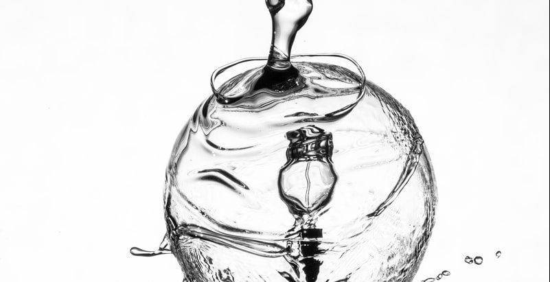 water dropping on light bulb